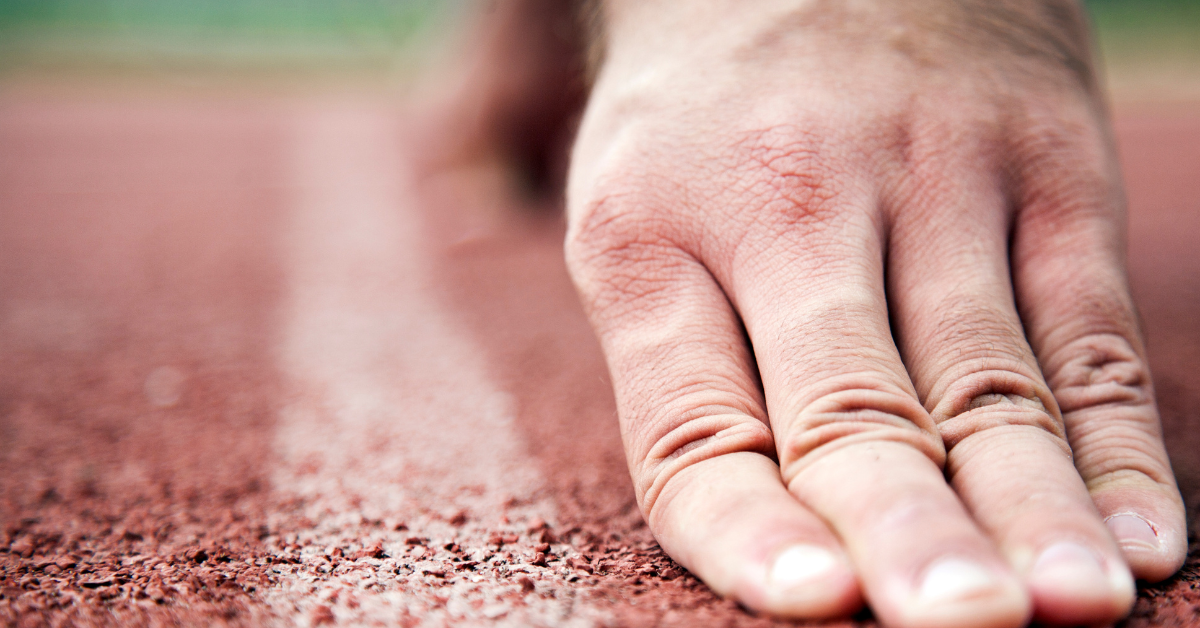 hands at starting line